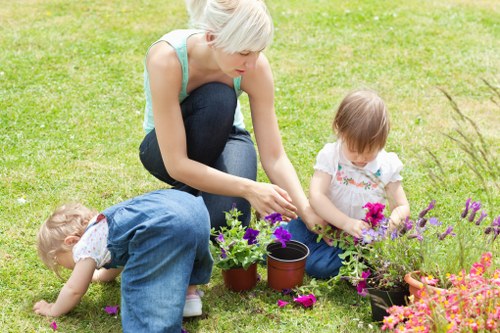 Professional landscapers completing safe outdoor work